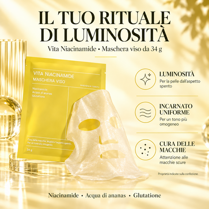 Maschera viso Biodance Vita Niacinamide in tessuto su un piatto con confezione gialla